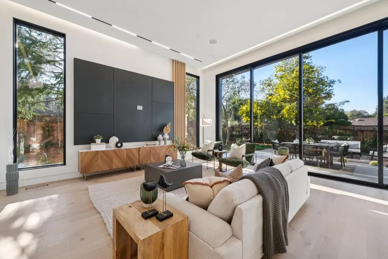 Linear light carried across a living room ceiling