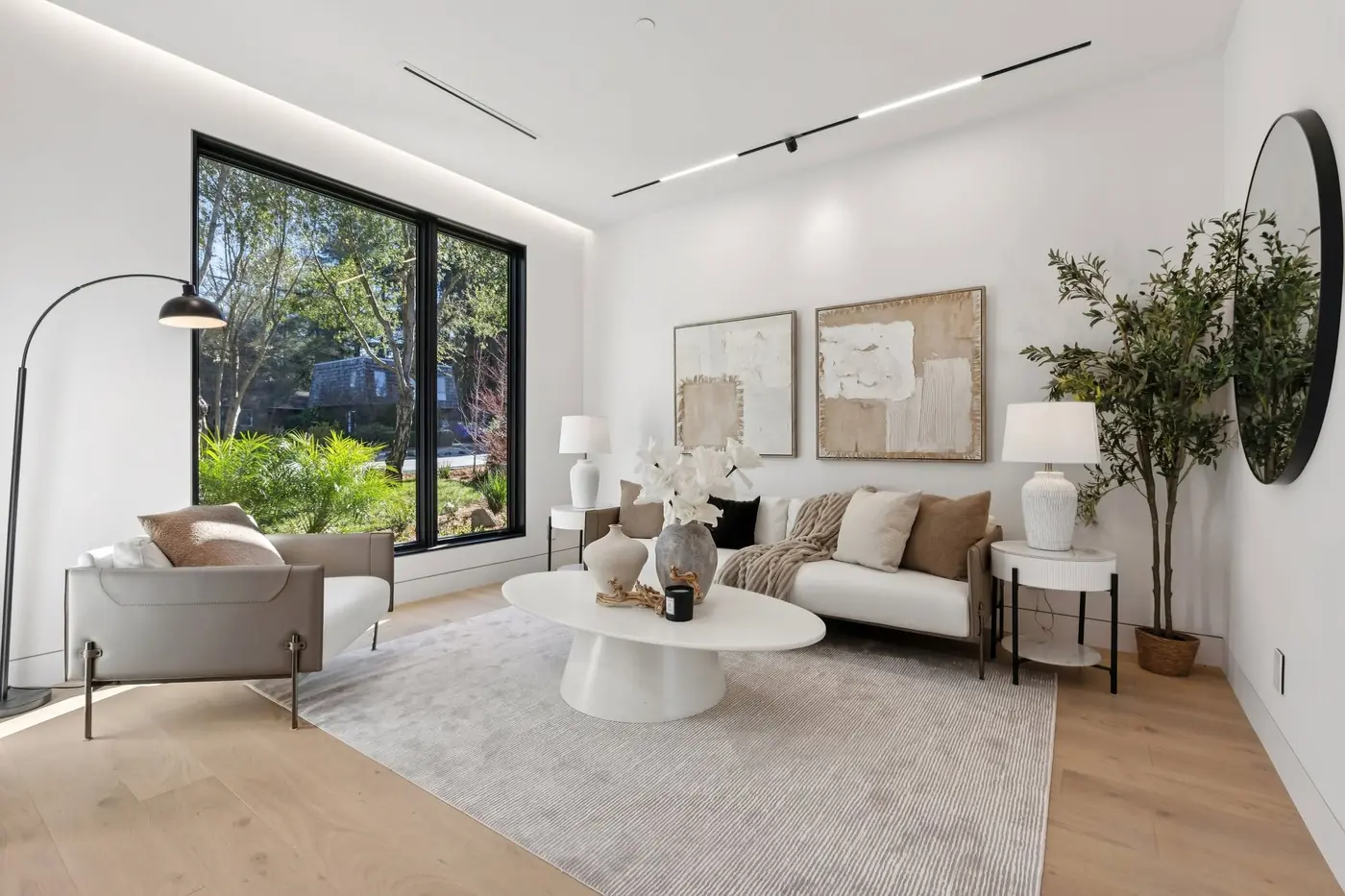 Sitting area beside full height glazing