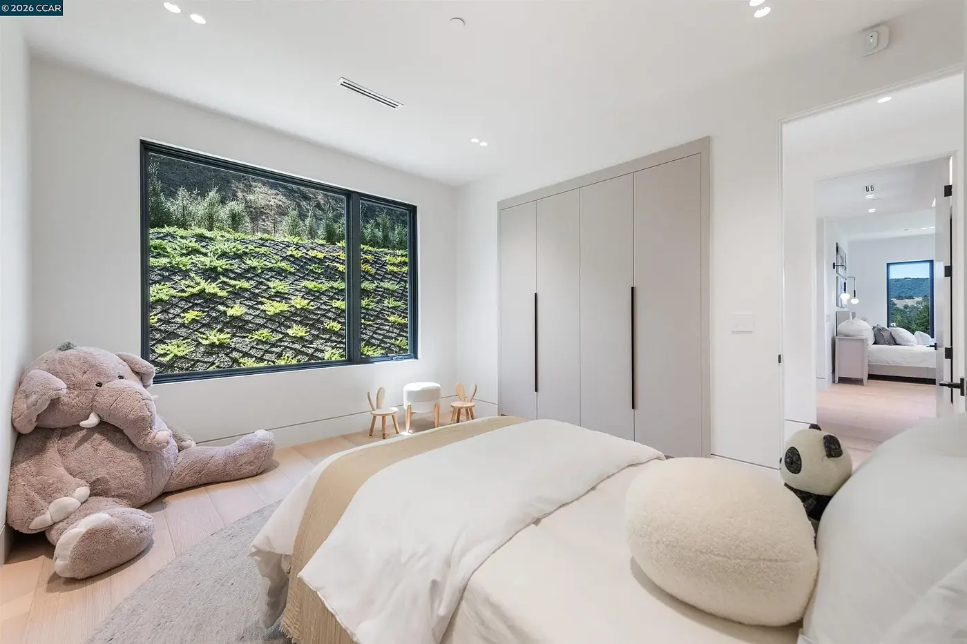 Children's room with a backlit planted panel